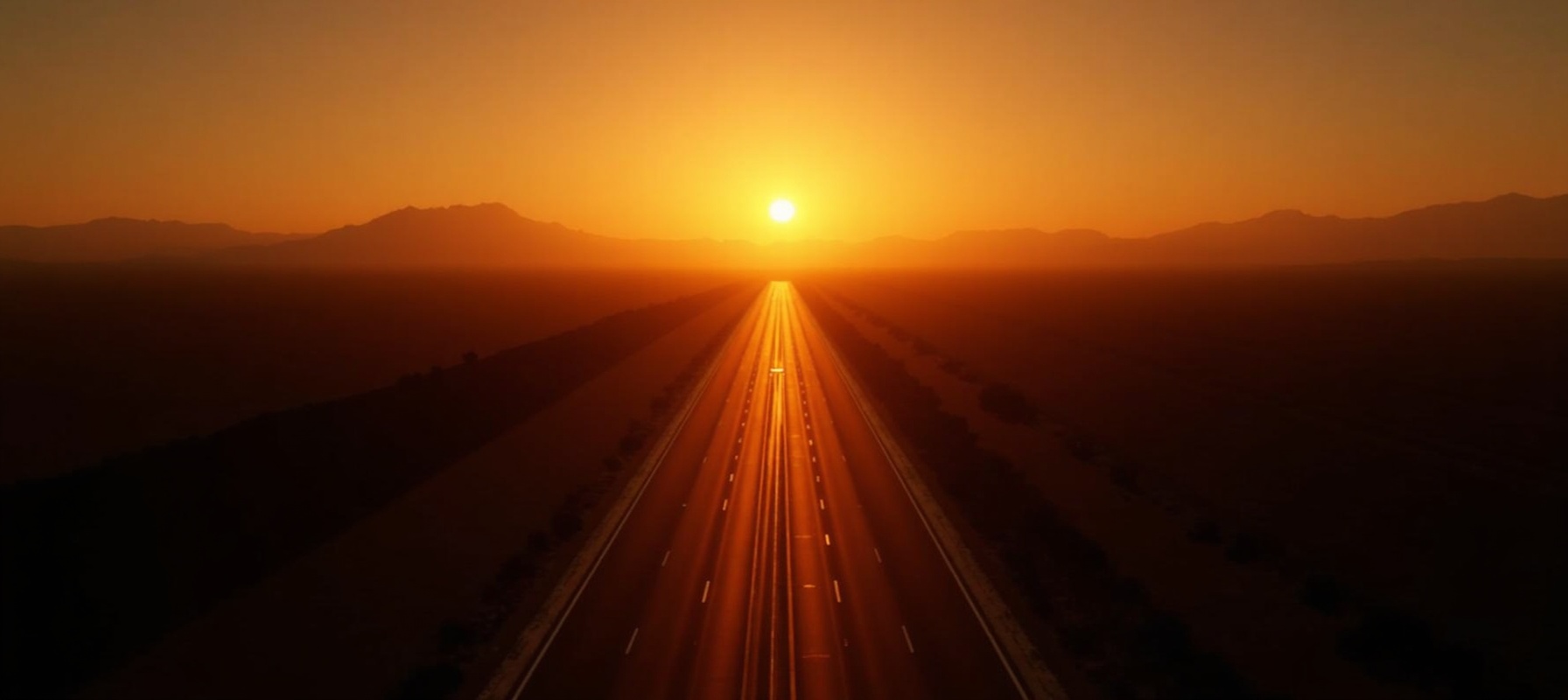 Open highway at sunset